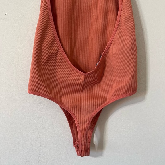 Fashion Nova Pink Salmon Halter Neck Backless Ribbed Thong Bodysuit - Picture 7 of 9